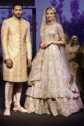 Tissue Fabric Mauve Designer Bridal peplum lehenga and golden sherwani